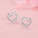 Silver Heart Hollow Diamond Earrings | Adriana