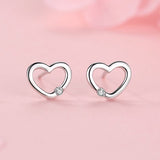 Silver Heart Hollow Diamond Earrings | Adriana