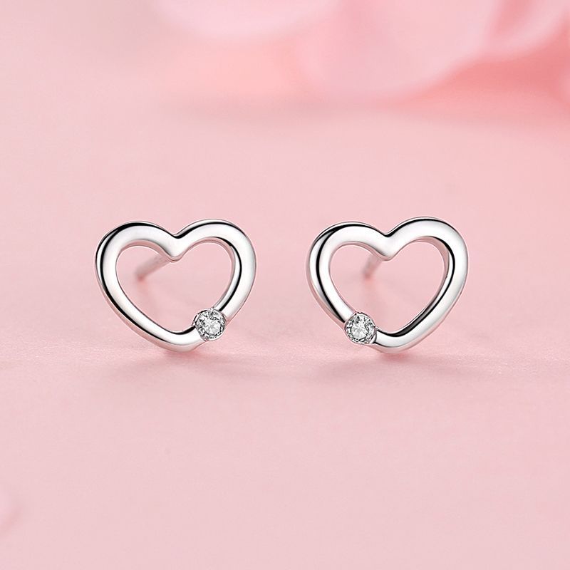 Silver Heart Hollow Diamond Earrings | Adriana